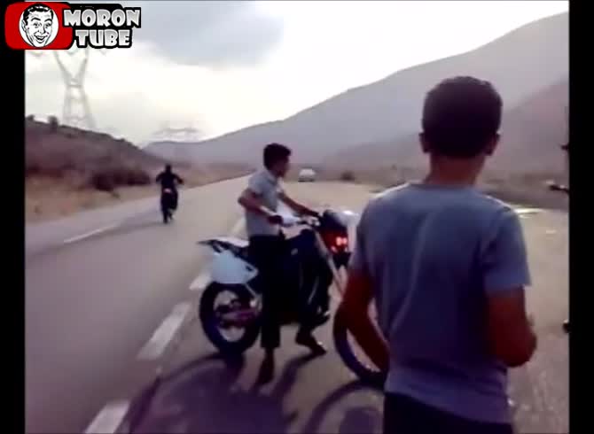 Video :A scooter rider in Iran meets a tragic death as they are crushed beneath a bus